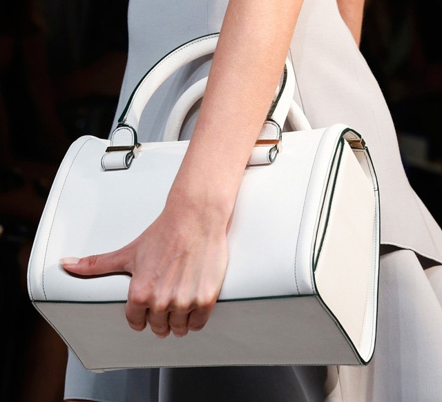 Reference image illustrating Victoria Beckham Spring 2014 Handbags: Petite Duffels and Triangular Prints