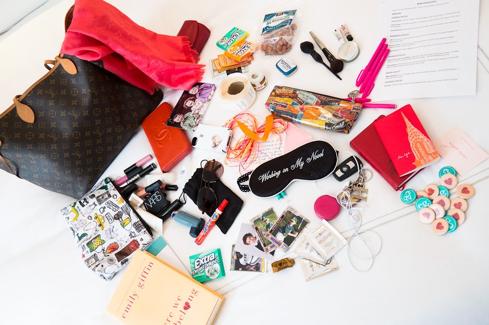 Reference image illustrating What Bestselling Author Emily Giffin Carries in Her Designer Handbag