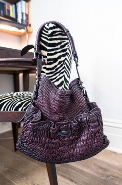 What’s Inside Margaret Hyde’s Handbag: A Luxe Plum Leather Edit thumbnail