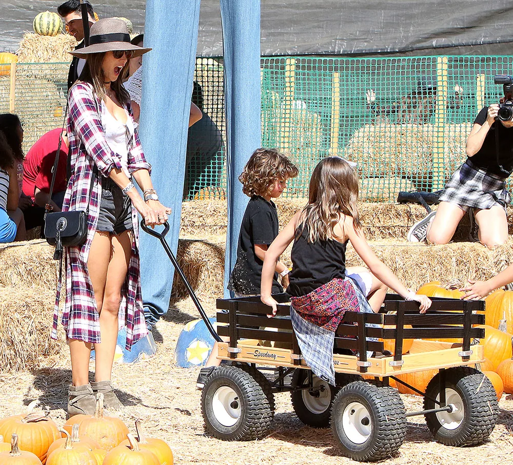 Reference image illustrating Celebrity Mom Handbag Style: What Alessandra Ambrosio, Chrissy Teigen, and More Carry with Their Kids