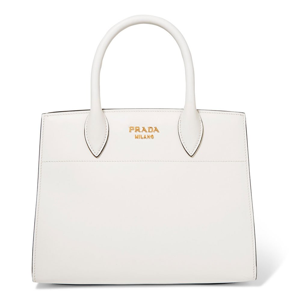 Reference image illustrating Decode Her Style: What Your Mom’s Designer Handbag Reveals About Her Personality