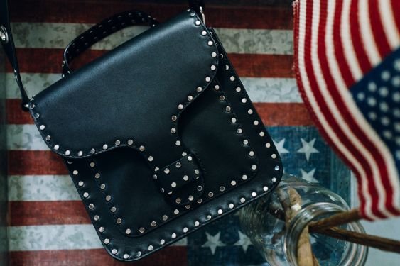 Rebecca Minkoff Midnighter Top Handle Bag Review: A Lightweight Studded Crossbody Under $300 thumbnail