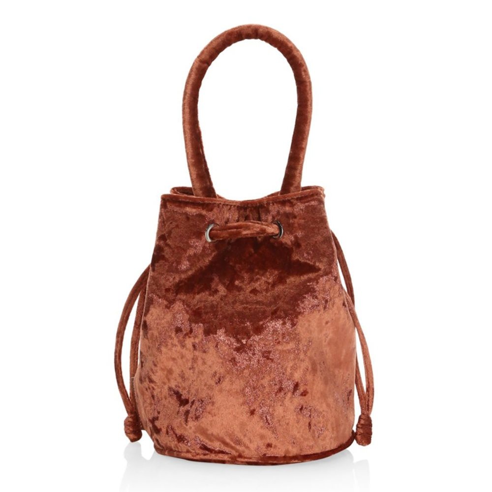 Reference image illustrating 12 Holiday Party Handbags That Make a Statement: Velvet, Crystals & More