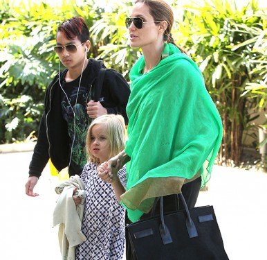 Angelina Jolie’s Go-To Travel Bag: The Saint Laurent Sac de Jour in Suede thumbnail