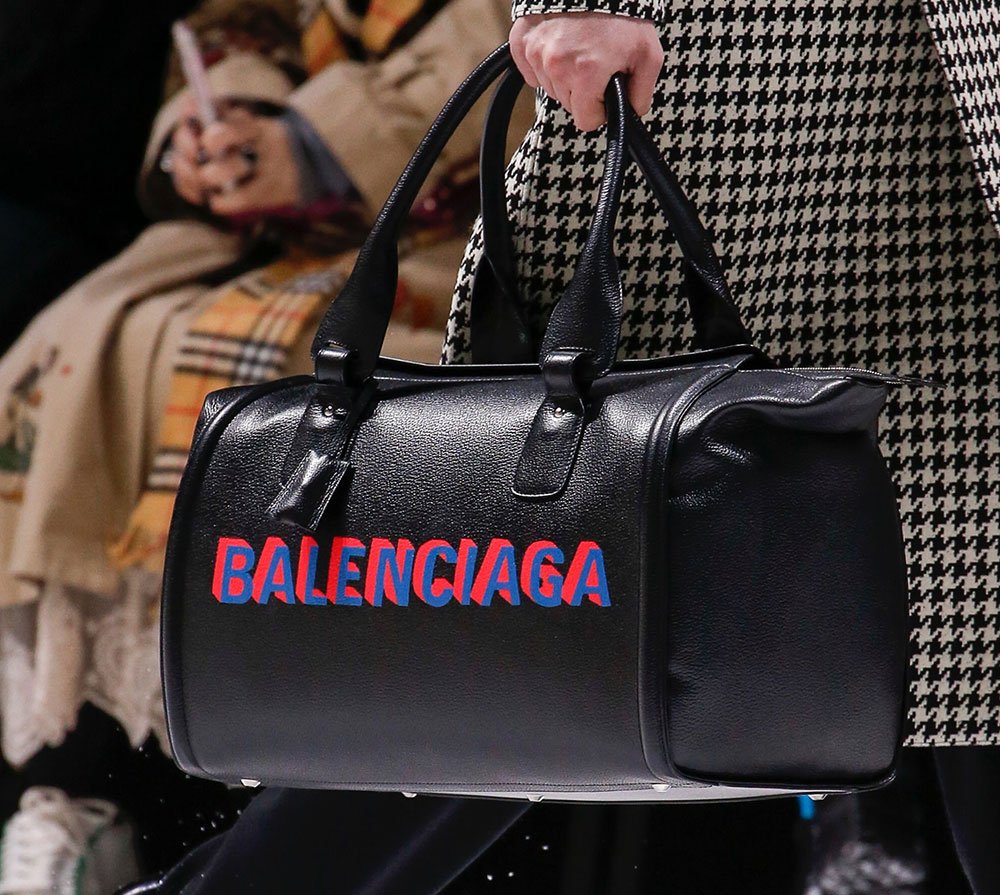 Reference image illustrating Balenciaga Fall 2018 Bags: Loud Logos, Puppy Prints, and a World Food Programme Partnership