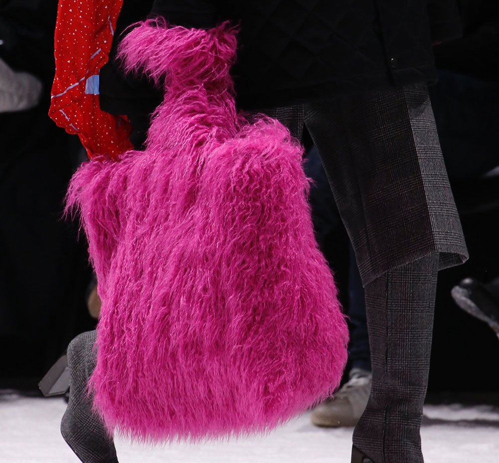 Reference image illustrating Balenciaga Fall 2018 Bags: Loud Logos, Puppy Prints, and a World Food Programme Partnership