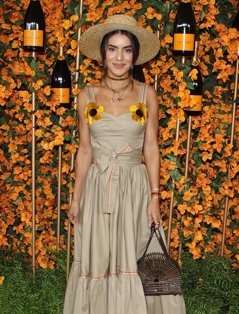Reference image illustrating Celebrity Handbag Trends from the 2018 Veuve Clicquot Los Angeles Polo Classic