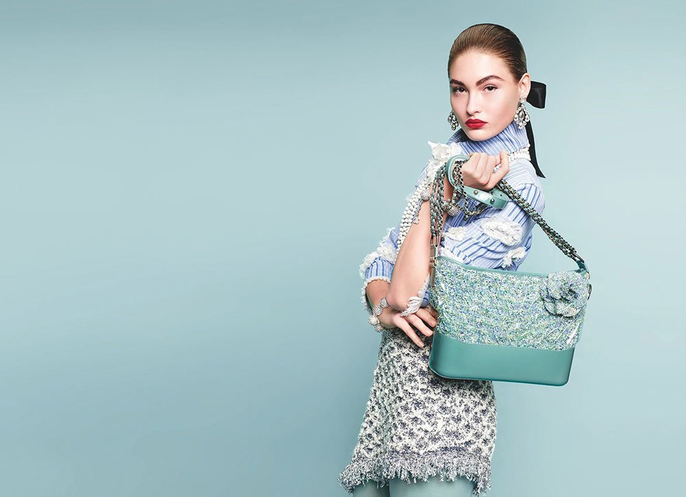 Reference image illustrating Chanel Spring 2018 Handbag Campaign: Pastel Knits and Soft Tones Preview