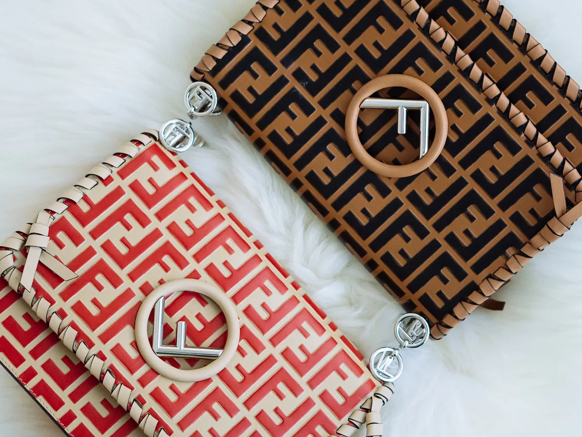 Reference image illustrating Fendi Kan I F Bag Spring 2018: All-Over Logo Leather with Whipstitch Details
