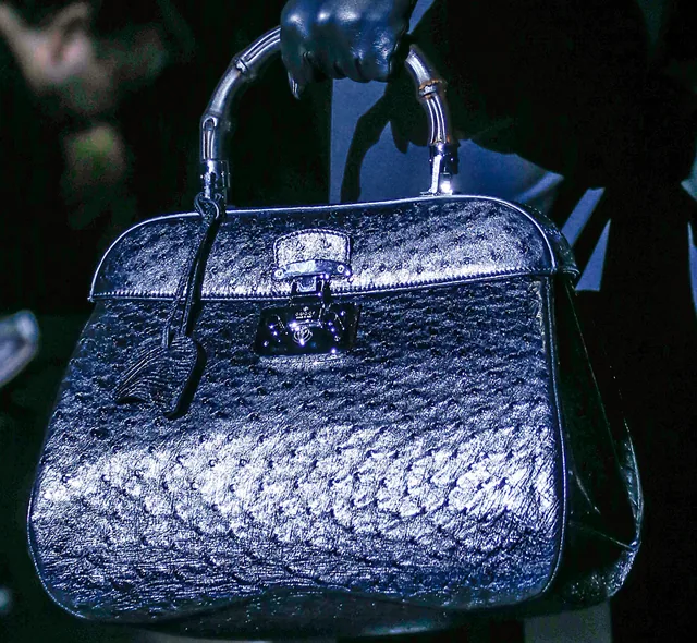 Reference image illustrating Gucci's Matte Black Bamboo Handle: A Modern Twist on a 1947 Icon for Fall 2013