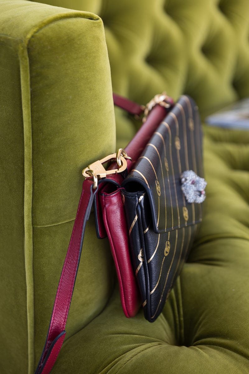 Reference image illustrating Gucci Thiara Medium Double Envelope Shoulder Bag Review: A Two-in-One Reversible Icon