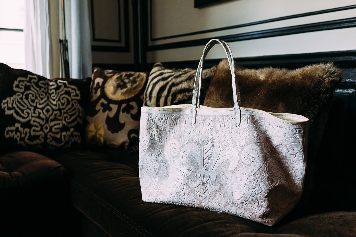 Reference image illustrating Inside Aviva Drescher's Gucci Tennis Bag: Real Housewives of NYC What's In Her Bag