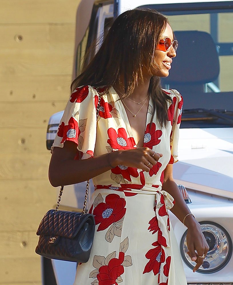 Reference image illustrating Jasmine Tookes and Her Black Chanel Classic Flap Bag: A Year-Round Style Study