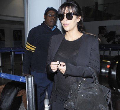 Kim Kardashian’s All-Black Airport Look: Balenciaga City Bag and Givenchy Sandals thumbnail