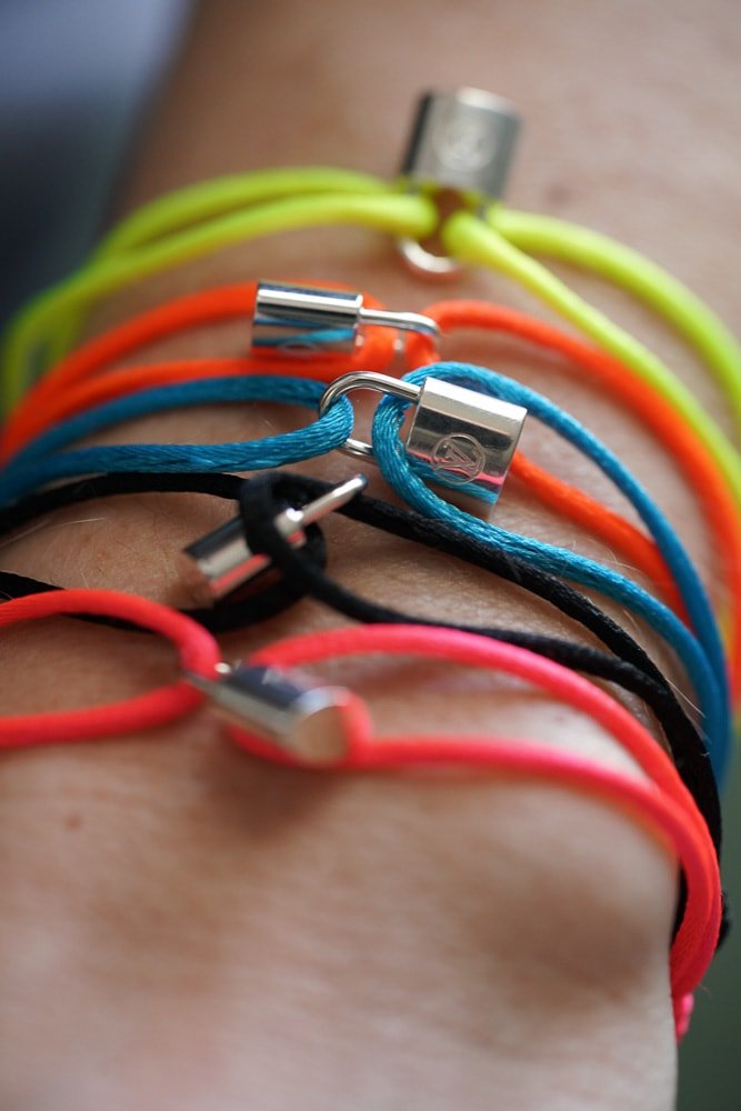 Reference image illustrating Louis Vuitton Silver Lockit Fluo Bracelet for UNICEF: A Stylish Way to Support Vulnerable Children