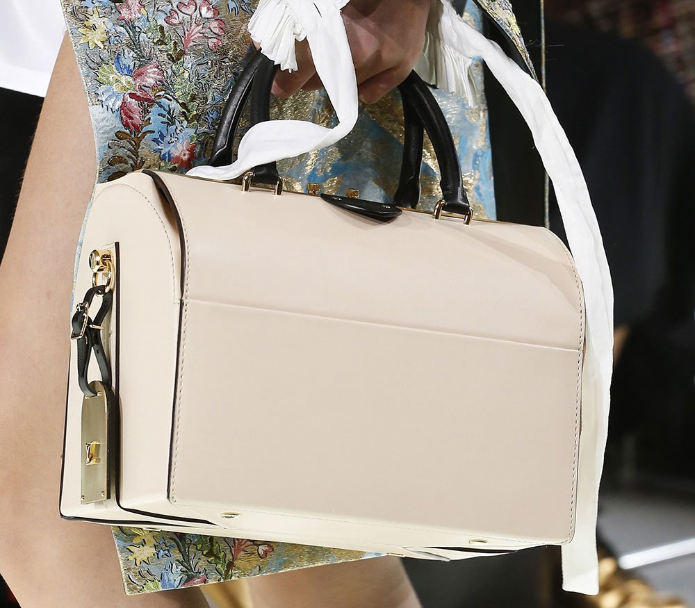 Reference image illustrating Louis Vuitton Spring 2018 Runway Bags: Angular Shapes and a Streamlined Speedy