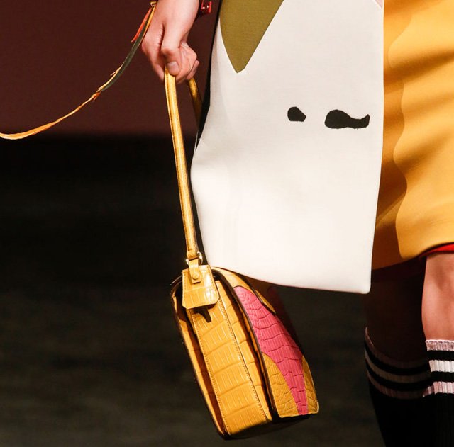Reference image illustrating Prada Spring 2014 Handbags: Artistic Portraits and Feminist Design