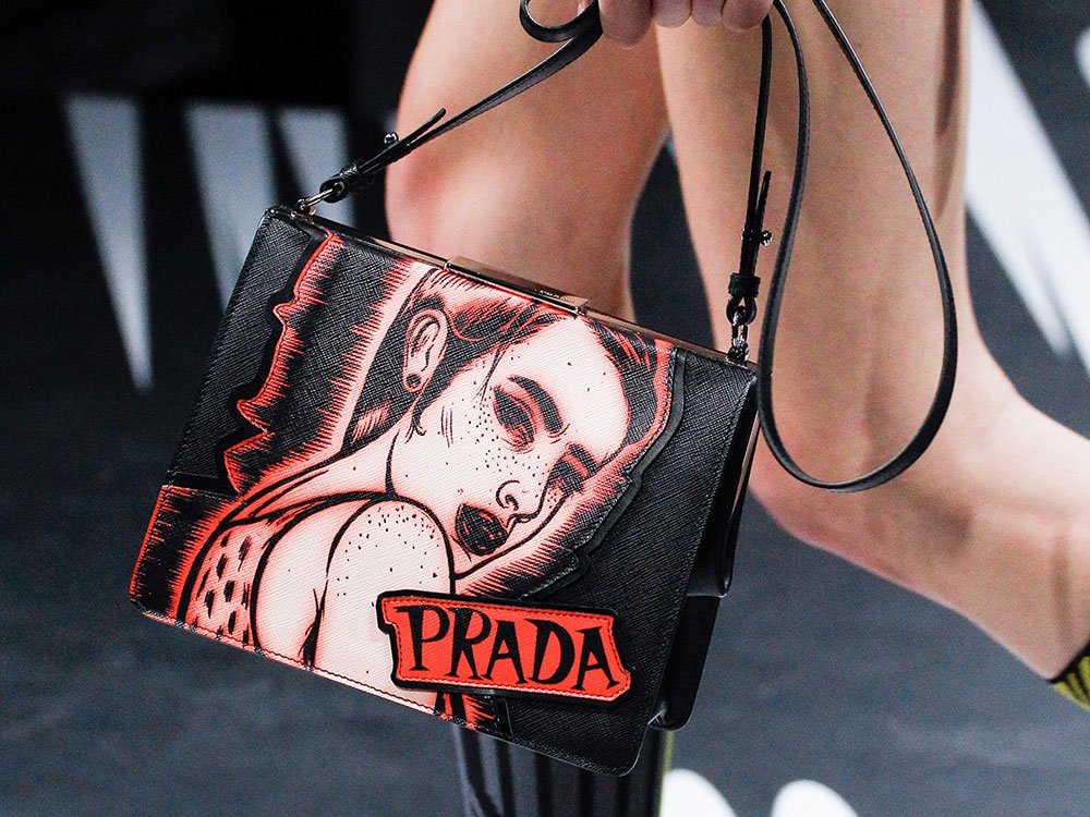 Reference image illustrating Prada Spring 2018 Runway Bags: Nylon, Comic Heroines, and Punk Details
