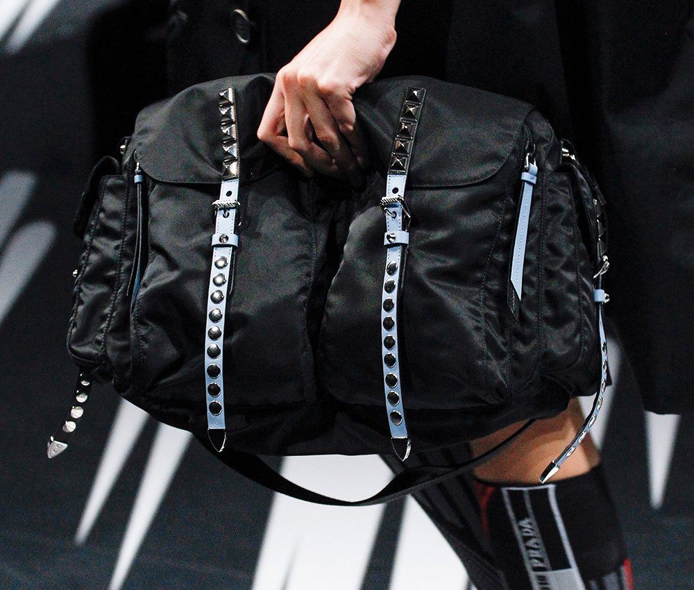 Reference image illustrating Prada Spring 2018 Runway Bags: Nylon, Comic Heroines, and Punk Details