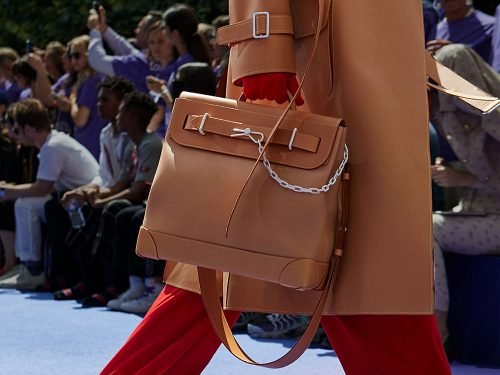 Virgil Abloh's First Louis Vuitton Collection: Transparent Keepalls, Grenade-Pin Details, and Neon Accents thumbnail