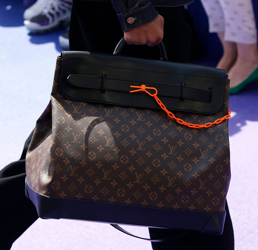 Reference image illustrating Virgil Abloh's First Louis Vuitton Collection: Transparent Keepalls, Grenade-Pin Details, and Neon Accents
