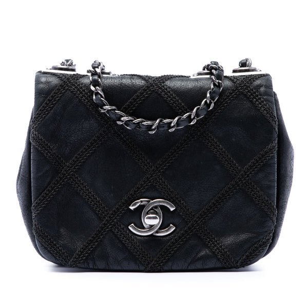 Reference image illustrating Chanel Diamond Stitch Chain Flap Bag: A Collector’s Guide to the Quilted Iridescent Calfskin Small