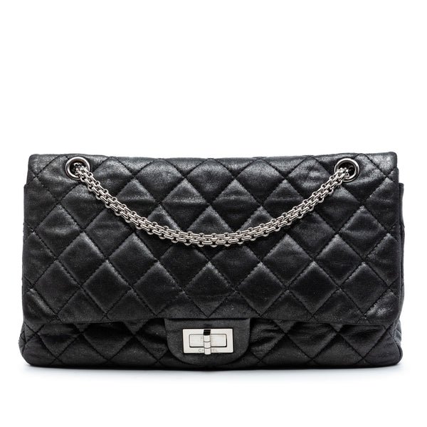 Reference image illustrating Chanel Reissue 2.55 Flap Bag Quilted Aged Calfskin 227: A Timeless Icon Reborn